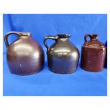3 vintage stoneware jug.   2 have chips.   Look
