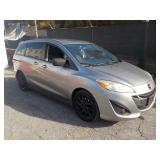 2011 Mazda 5R runs good.