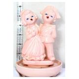 Vintage pink porcelain singing boy/girl figure