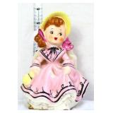 Vintage little girl in pink dress figure