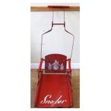 Vintage red folding childs sled