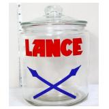 Clear round glass Lance peanut jar