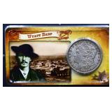 1900 Morgan dollar on Wyatt Earp Info card