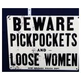 Metal Pickpockets and Loose Women sign