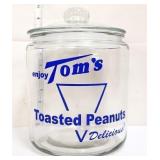 Glass Toms Peanut canister w/ blue writing