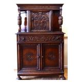 1920s oak Jacobean blind china cabinet