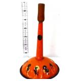 Vintage orange/black tin litho noisemaker