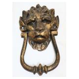 Cast iron lion face door knocker