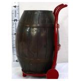 Vintage metal barrel on dolly bank