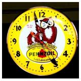 Round Pennzoil electric lighted clock
