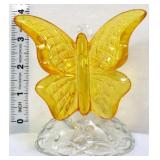 Fenton yellow topaz butterfly on clear branch