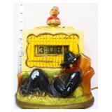 Vntg Tele-Vision monkey organ grinder metal clock