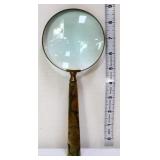 Magnifying glass with wood tone handle