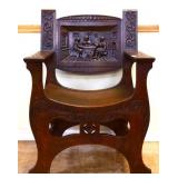 Vintage carved oak fireside chair