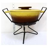 Vintage Hull yellow casserole bowl in wire stand