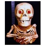 Cast iron mechanical skeleton bank