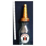 Glass Farmall oil bottle w/ lid