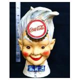 Cast iron Coca Cola sprite boy bank
