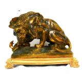 Resin bronze tone lion & snake figure
