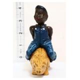 Cast iron americana boy on pig bank