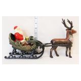 Cast Iron Santa in sleigh with one reindeer
