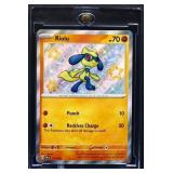 NM Pokemon Riolu Paldean Fates Shiny card