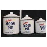 Trio of enamel Moon Pie canisters