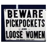 Metal Pickpockets and Loose Women sign