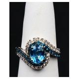 Sterling oval cut blue topaz ring, lab created