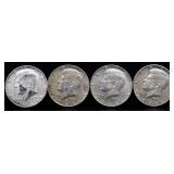 Lot of 4 1969 Kennedy half dollars
