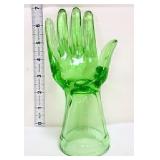 Green glass jewelry hand