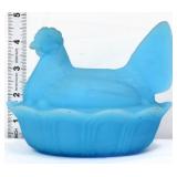 Vintage blue satin hen on nest