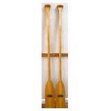 Pair blonde wood Feather Brand oars