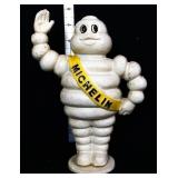 Cast iron 8in Michelin man figural bank
