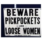 Metal Pickpockets and Loose Women sign