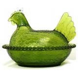 Green glass hen on nest