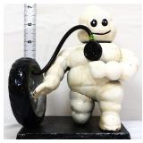 Cast iron kneeling Michelin man