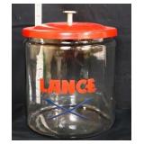 Round glass Lance jar w/ red metal lid