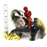 Vntg Americana boy riding elephant figure