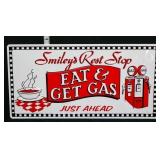 Metal embossed 17x8.5 Smileys Rest Stop sign