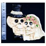 Cast iron skulls coin tray