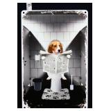 Metal dog reading paper bathroom sign