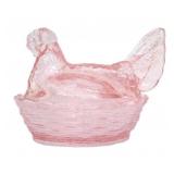 Pink glass hen on nest