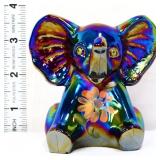 Fenton carnival sitting elephant w/ flowers