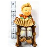 Hummel Practice Makes Perfect figure in rocker