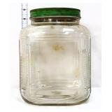 Vintage glass pantry jar w/ green lid