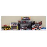 Lot of 12 race cars, some in org packages