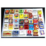 Lot of adv matchbooks in glass showcase