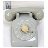 Vintage grey plastic toy rotary phone