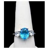 Sterling oval cut blue topaz ring, lab created